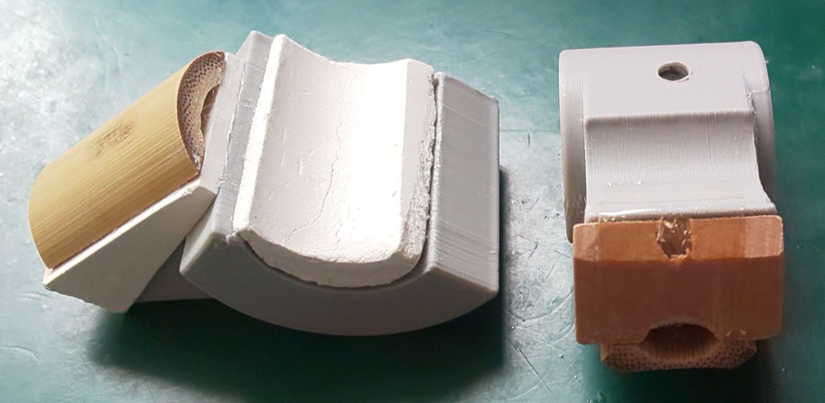 竹と紙粘土で作った試作品(左)と、3Dプリンタで印刷した部品(右)